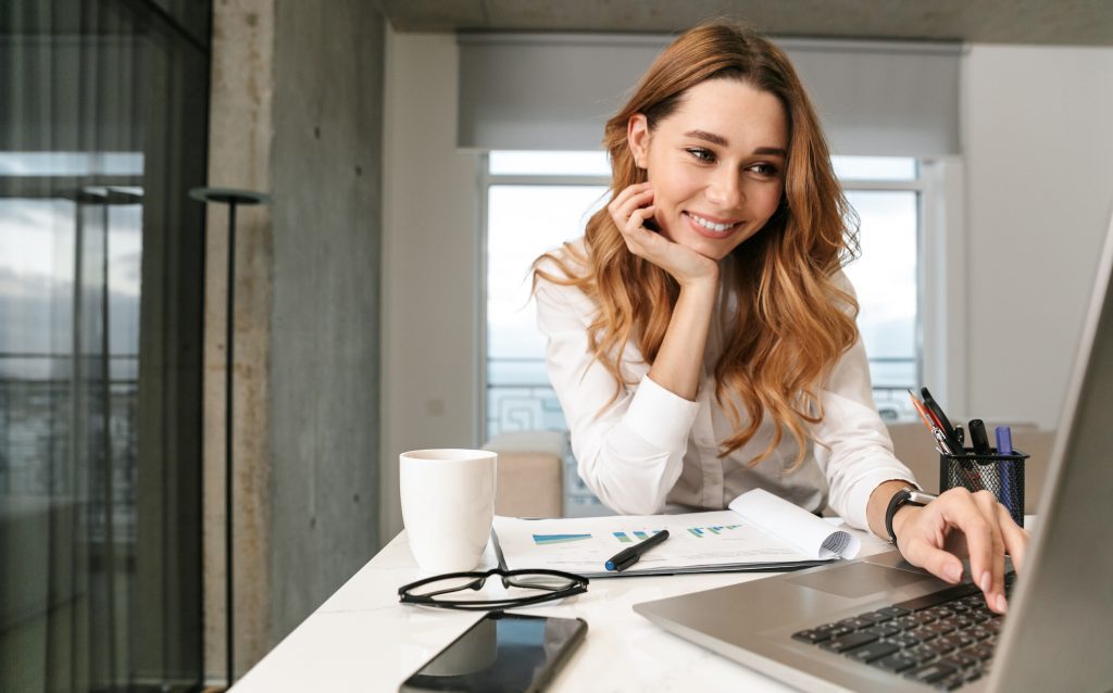 FairChange News_Young Business Woman Reading